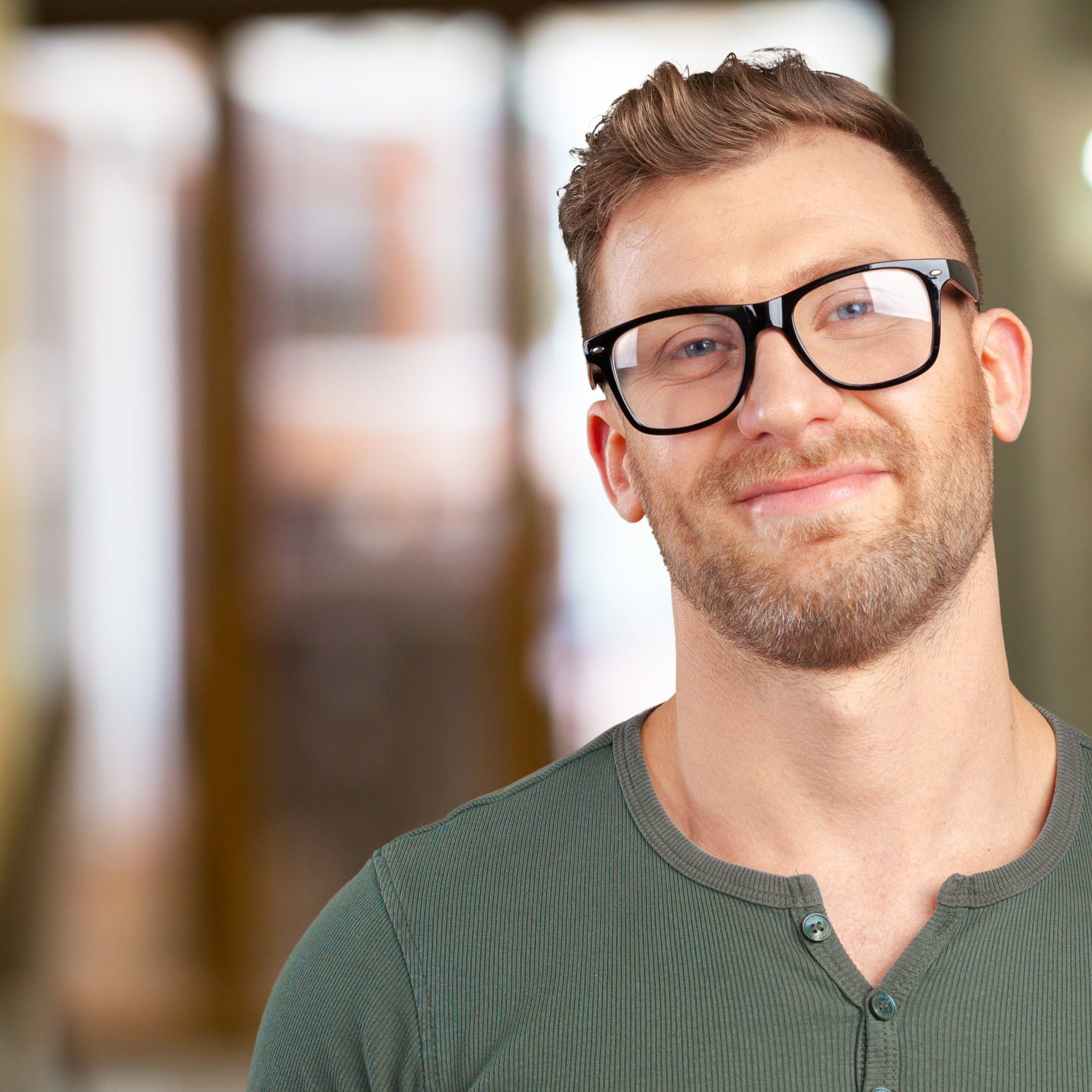 handsome man wearing glasses, studio shot